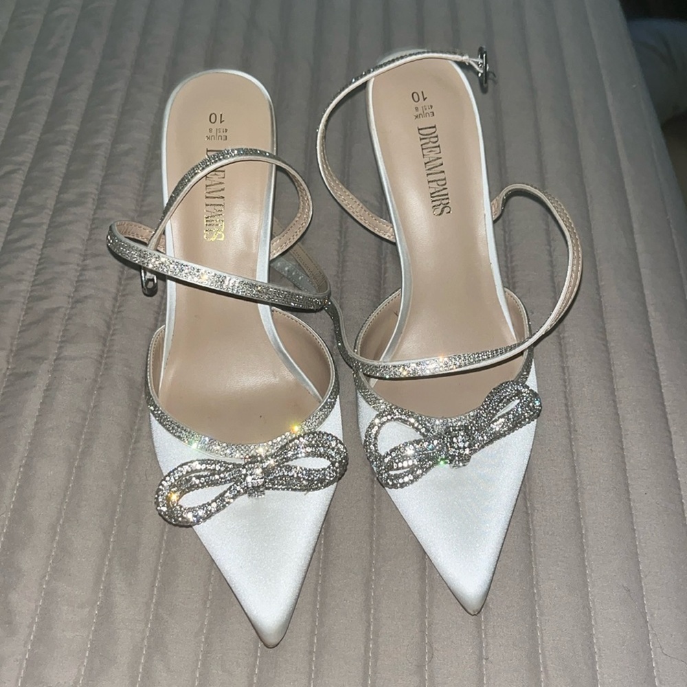 White heels with silver bows/straps